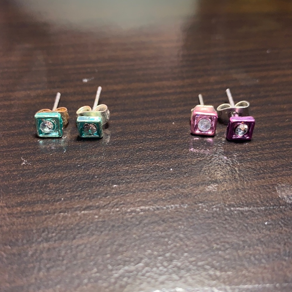 Purple and blue earrings from Claire’s